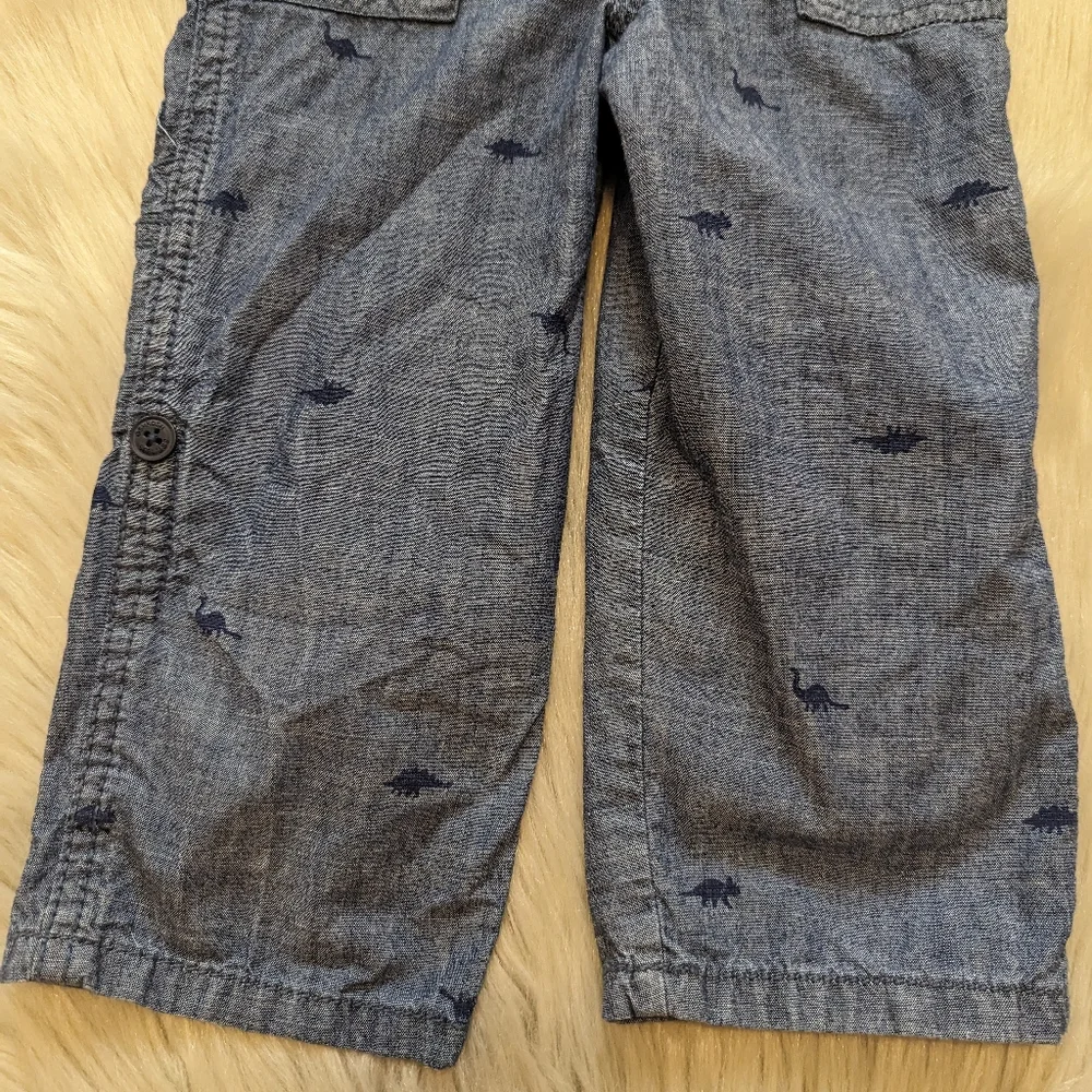 Oshkosh B'gosh blue overalls with navy blue dinosaur print size 2T